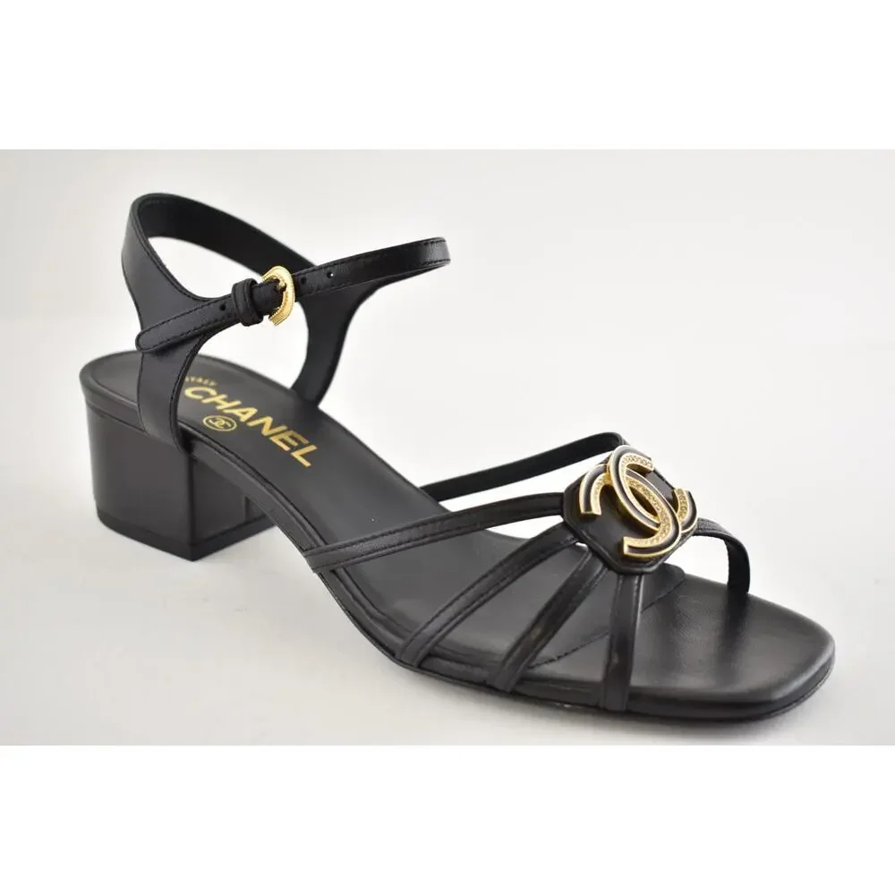 Chanel 25P Black Leather Crystal Gold CC Logo Ankle Strap Block Heel Sandal 37.5